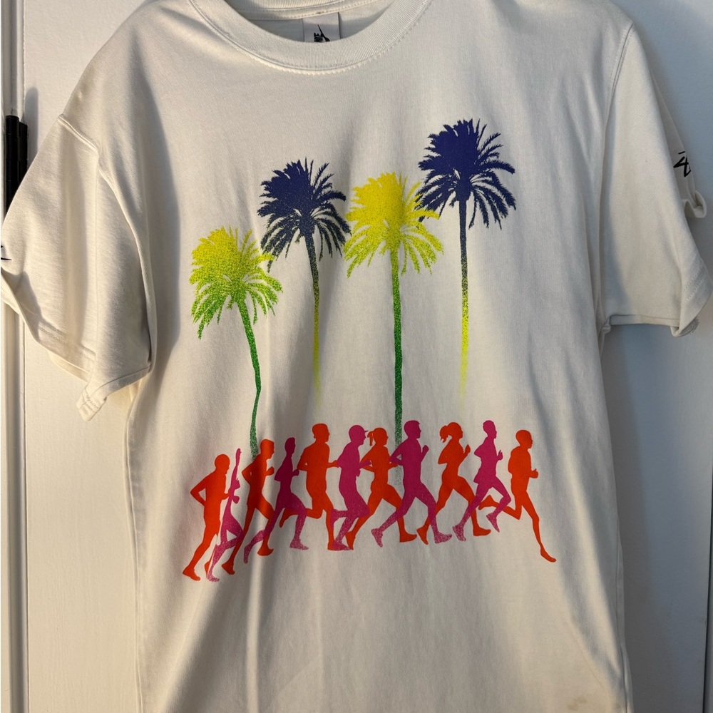 Nike Stussy White Tee with Colorful Palm and Runner Design